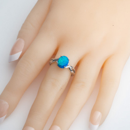 Ezüst gyűrű - kék ovális szintetikus opál | Argento-ekszer.hu