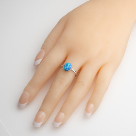 Ezüst gyűrű - kék ovális szintetikus opál | Argento-ekszer.hu