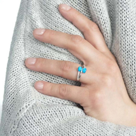 Ezüst gyűrű - kék ovális szintetikus opálok, átlátszó kerek cirkóniák | Argento-ekszer.hu